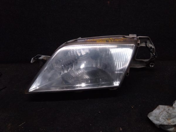 2000 FORD LASER LEFT HEADLAMP