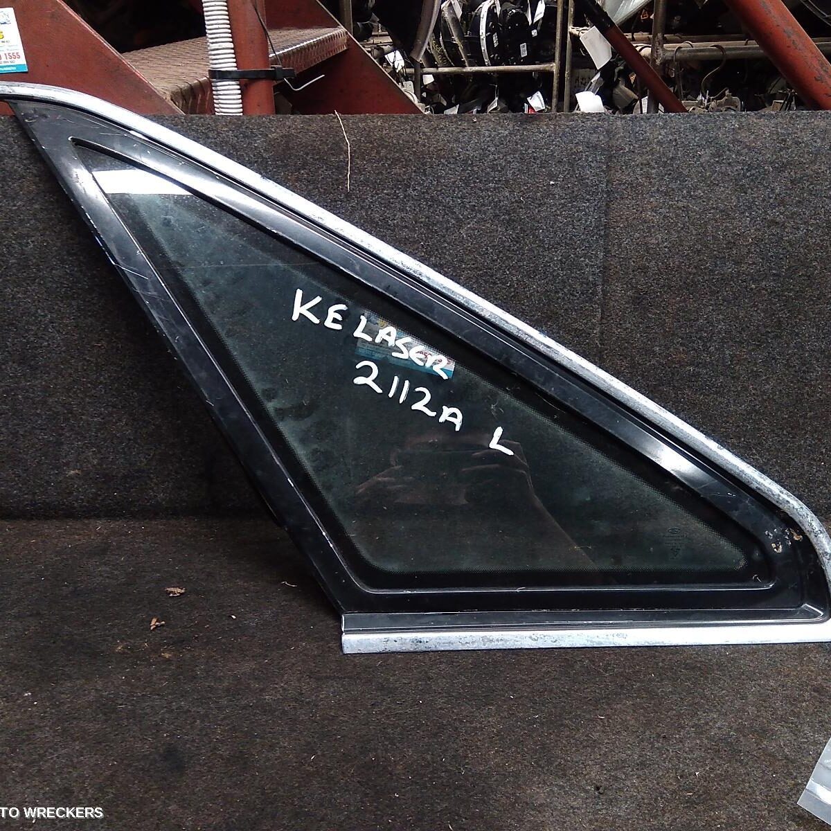 1989 FORD LASER Left Rear Side Glass