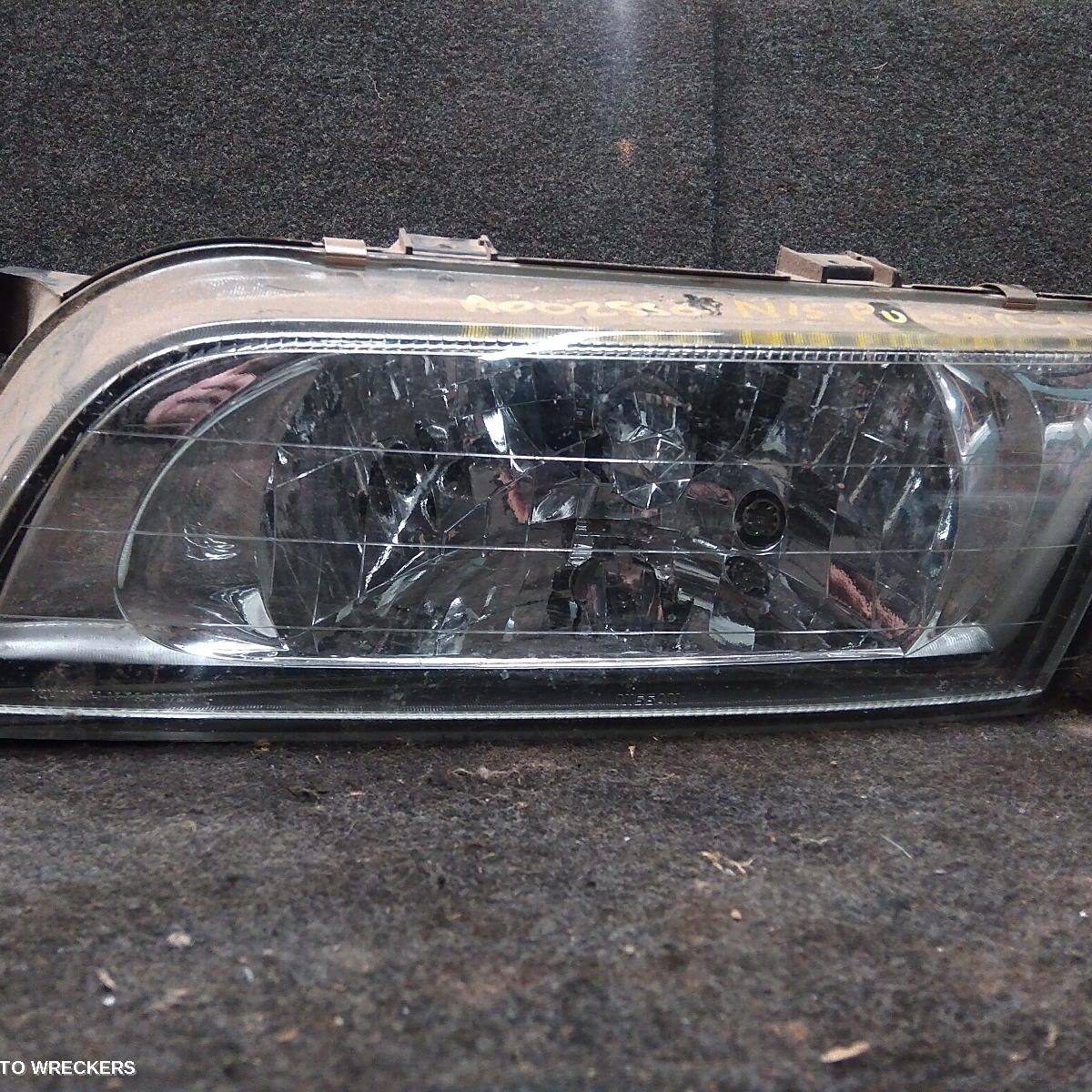 1999 NISSAN PULSAR Left Headlamp