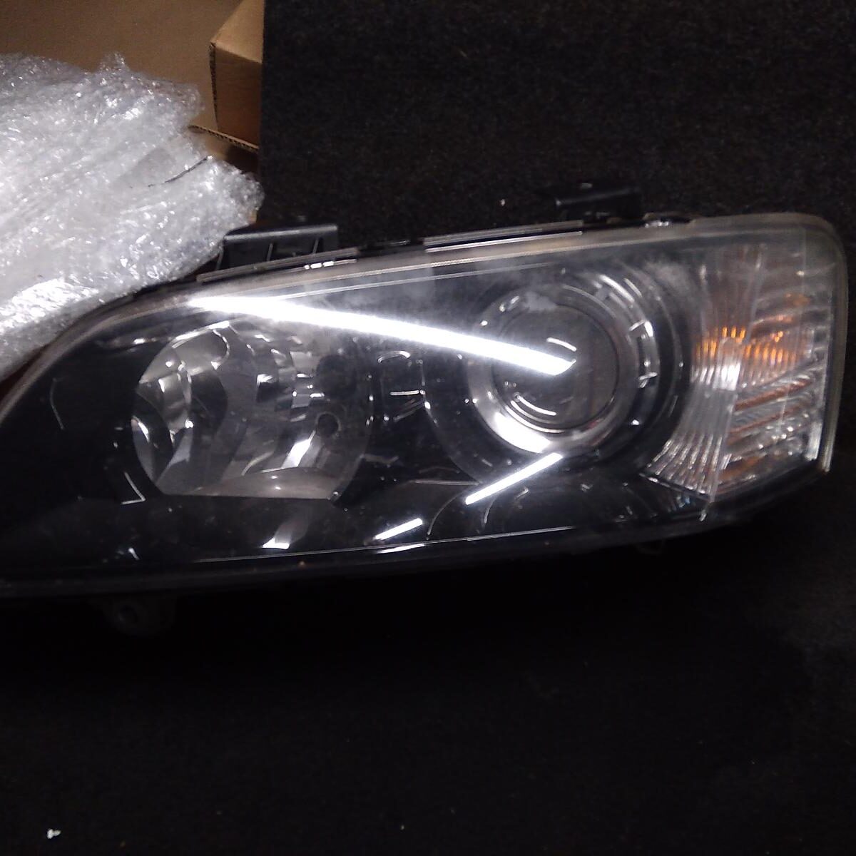 2010 HOLDEN COMMODORE LEFT HEADLAMP