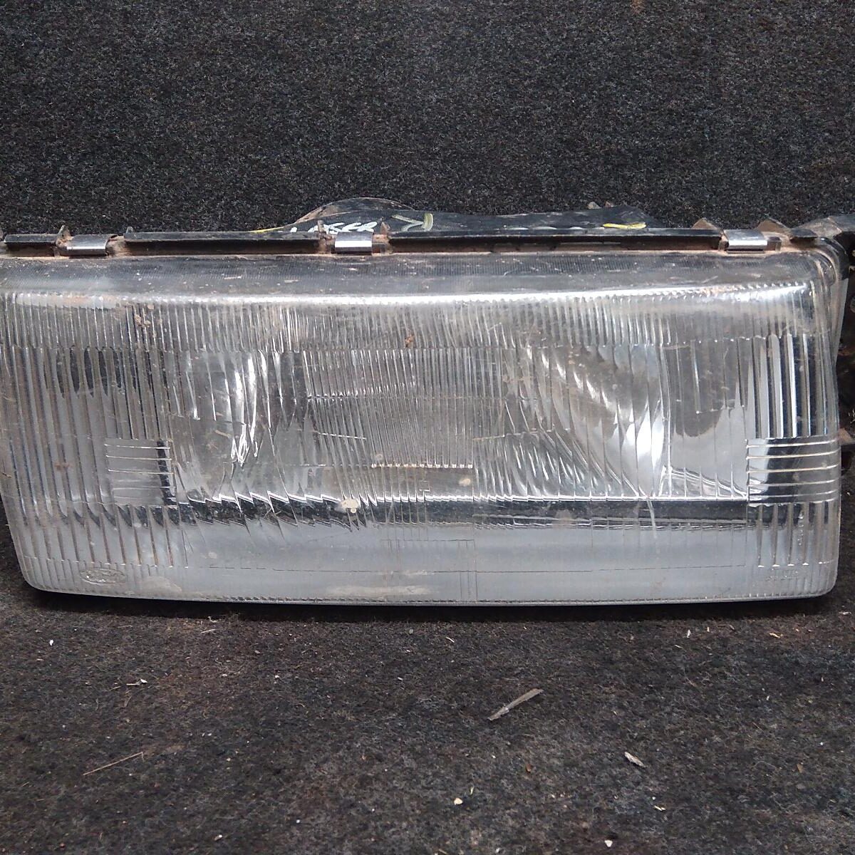 1990 FORD LASER RIGHT HEADLAMP