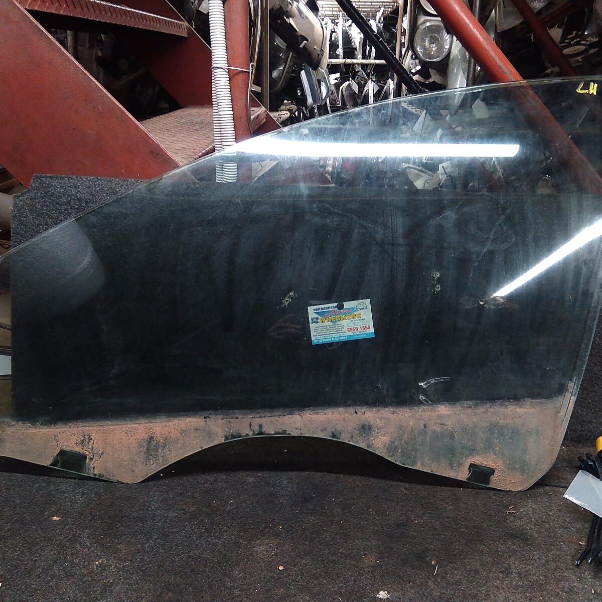 2008 HOLDEN COMMODORE LEFT FRONT DOOR WINDOW