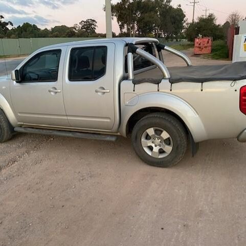 2010 NISSAN NAVARA LEFT FRONT DOOR