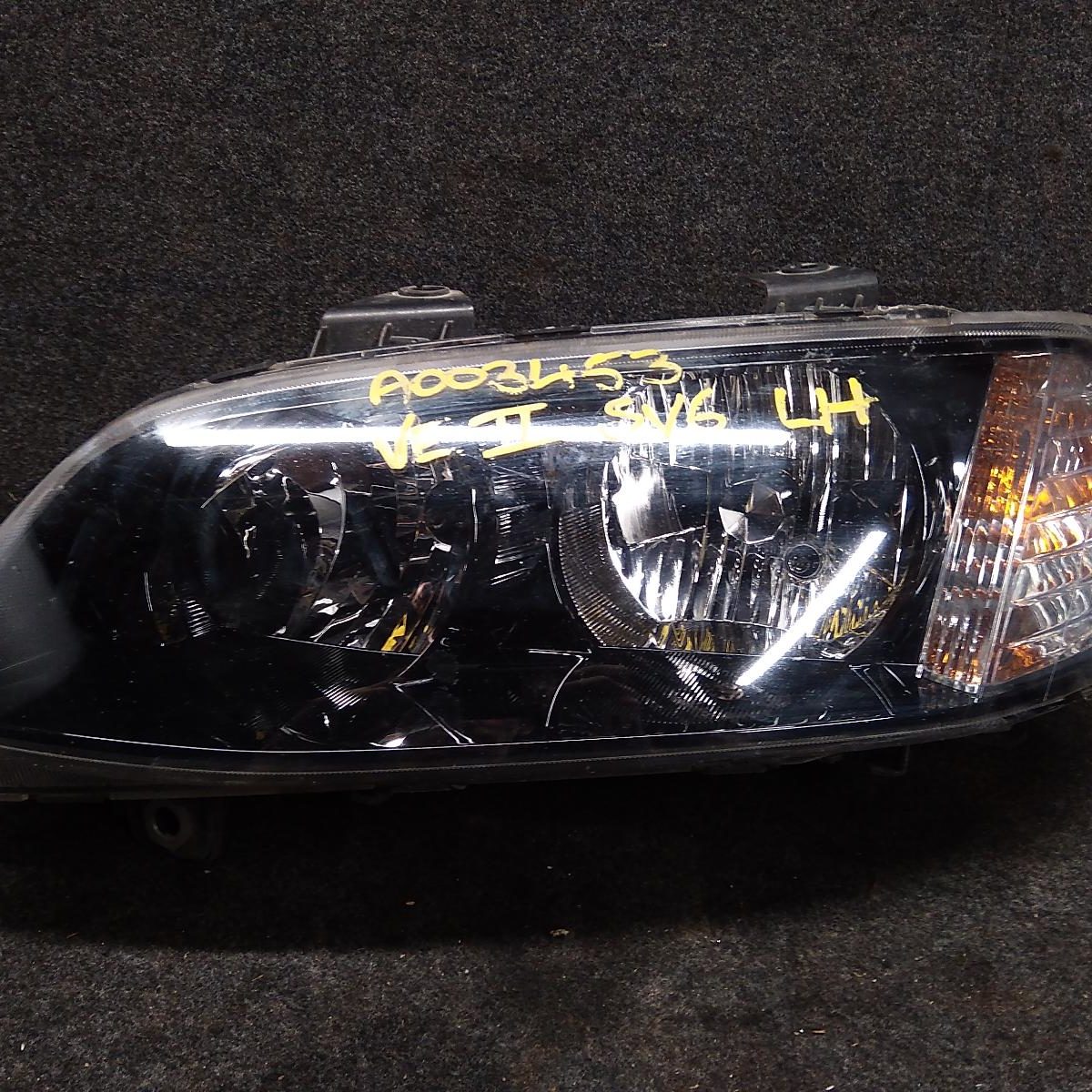 2011 HOLDEN COMMODORE LEFT HEADLAMP