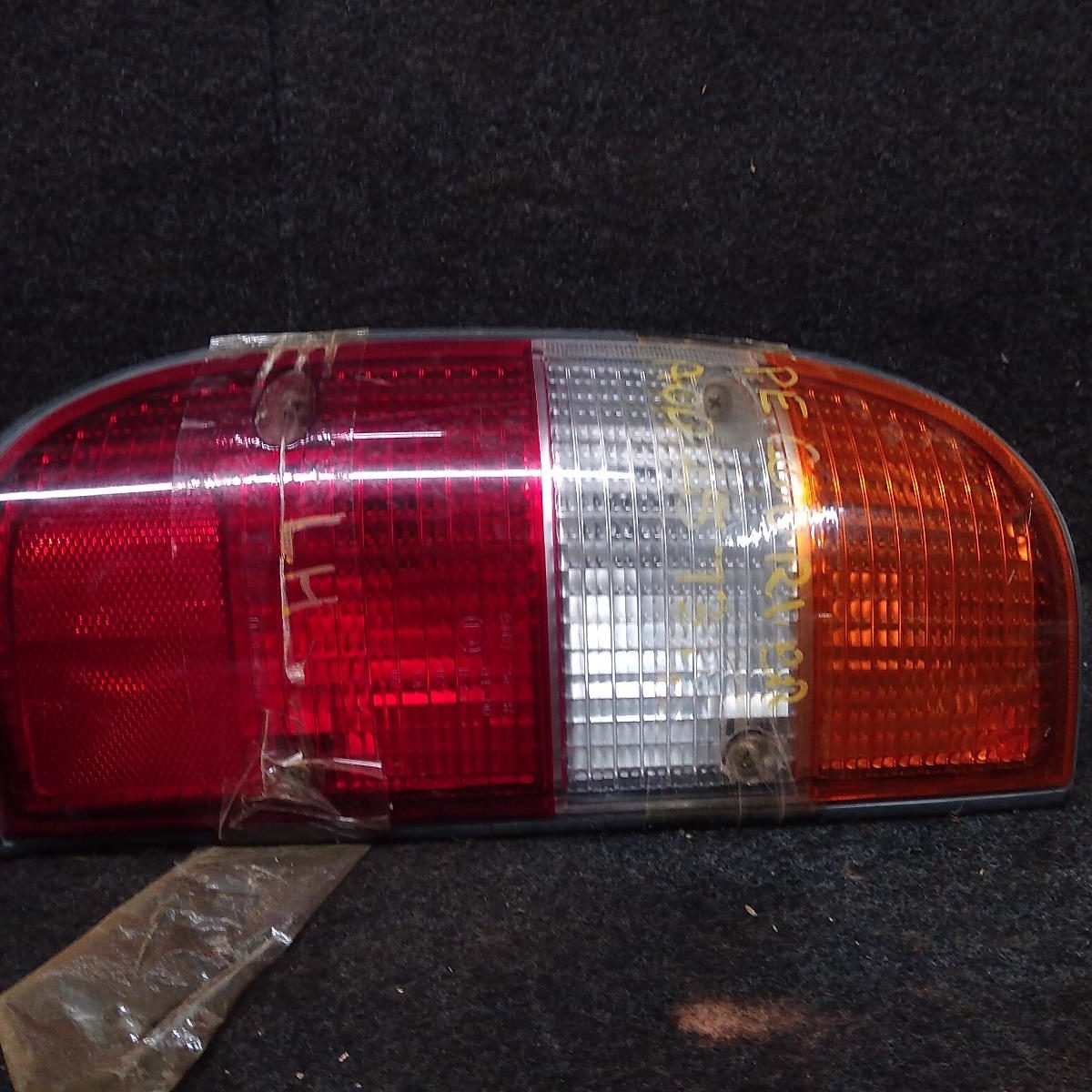2000 FORD COURIER LEFT TAILLIGHT