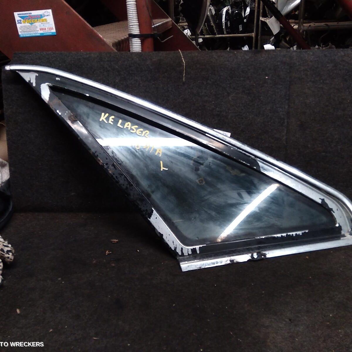 1989 FORD LASER Left Rear Side Glass